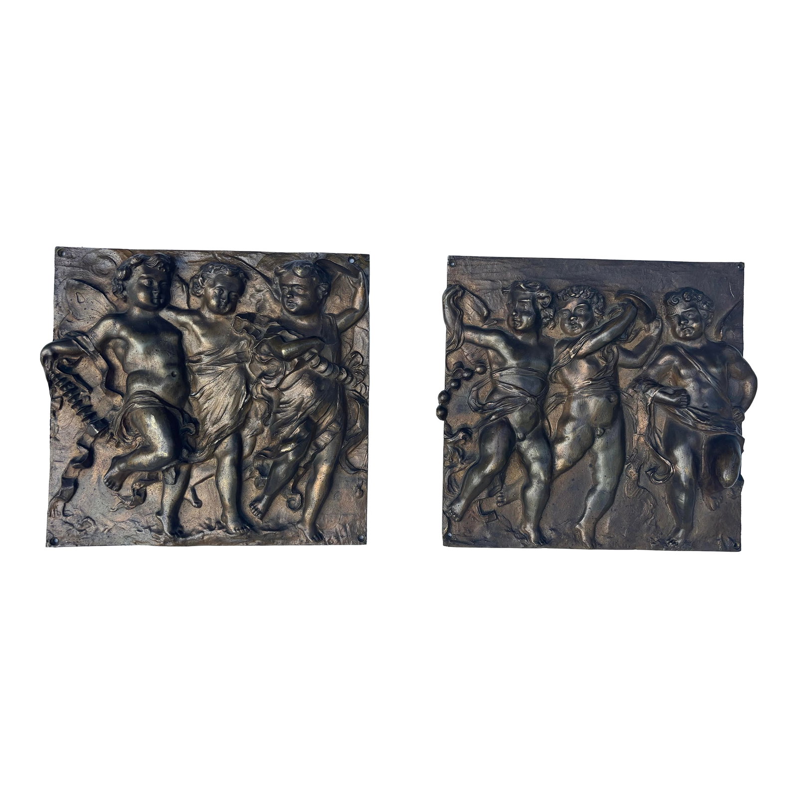 A Pair of French 19th Century Louis XVI St. Patinated Bronze Wall Plaques in the Manner of Clodion: Each plaque showcases beautifully sculpted classical figures and flowing drapery, rendered with the expressive movement and delicate detailing that define Clodion's celebrated style. The rich