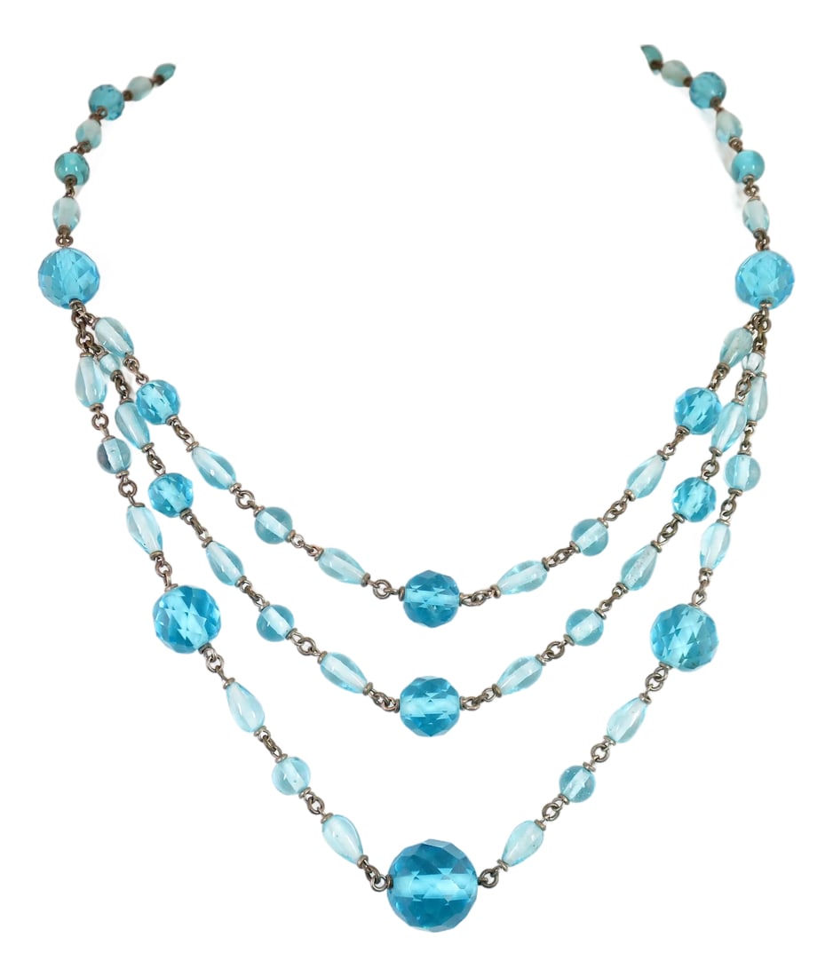 Antique Edwardian Aqua Crystal Draping Beaded Necklace 1910s: Antique Edwardian draping crystal bead bib necklace 1910s. Three center draping strands of graduated faceted aqua crystal beads, along with smooth round and teardrop smaller crystal beads, leading to