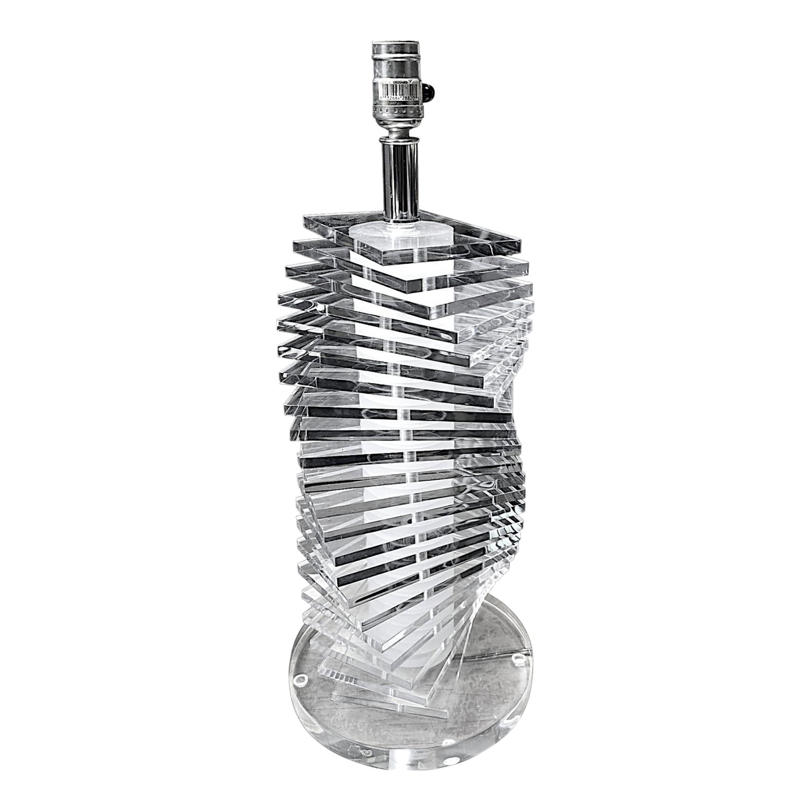 Vintage Mid Modernist Clear Lucite Stacked Tiled Skyscraper Table Lamp, Attributed to Bauer: Vintage Bauer style clear Modernist stacked Lucite tile twist table lamp . The tessellated design of the 1/4" thick tiles reflect and catch the light in varied angles. The stack of clear glass-like