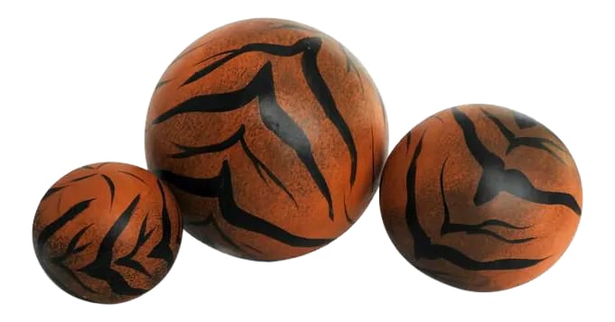 1980s Hand Painted Large Fired Clay Orbs With Tiger Print - Set of 3: Large fired clay orbs with hand painted animal print (tiger print). Circa 1980s. Perfect for coffee table centerpiece arrangements. Set of 3. The circumferences are 12", 17", and 25". Heavy. No