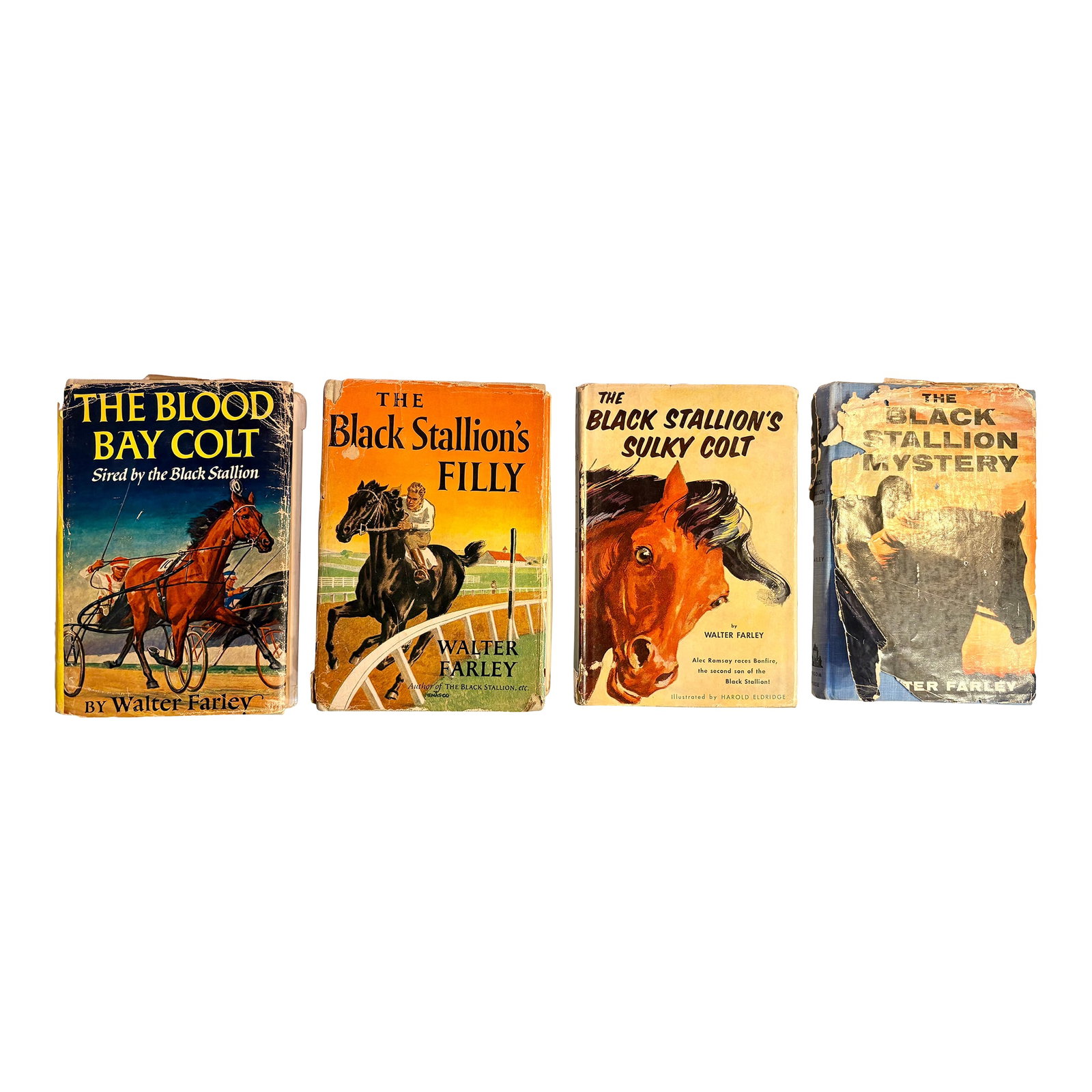 1950s Set of Four Rare First Edition Books From the Black Stallion Series by Walter Farley: "The Black was looking out on the open sea; his ears pricked forward, his thin-skinned nostrils quivering, his black mane flowing like windswept flame. Alec could not turn his eyes away, he could not