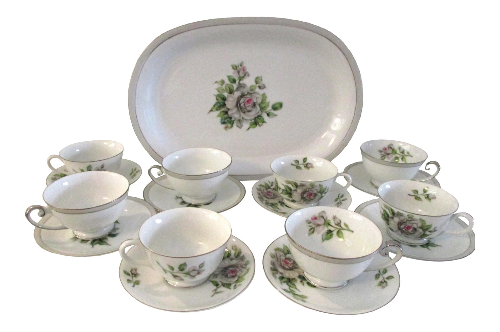 1950s Jyuto White Rose Porcelain Tea Set - 19 Pieces: Lovely mid-century Jyuto porcelain tea set consisting of eight cups, (4.75"L x 4"Dia x 2.5"H) eight saucers, (5.75"Dia x .75"H), and one large serving platter, (14.25"L x 10"W x 1.25"H). White