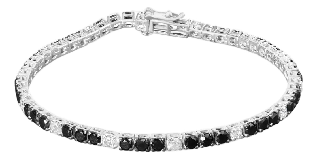 .925 Sterling Silver 6.0 Cttw Black and White Diamond Tennis Bracelet (I-J Color, I2-I3 Clarity) - 7: Elevate your style with this striking .925 sterling silver tennis bracelet, featuring a dazzling 6.0 carats of natural diamonds. Alternating between the brilliance of white diamonds and the rich,
