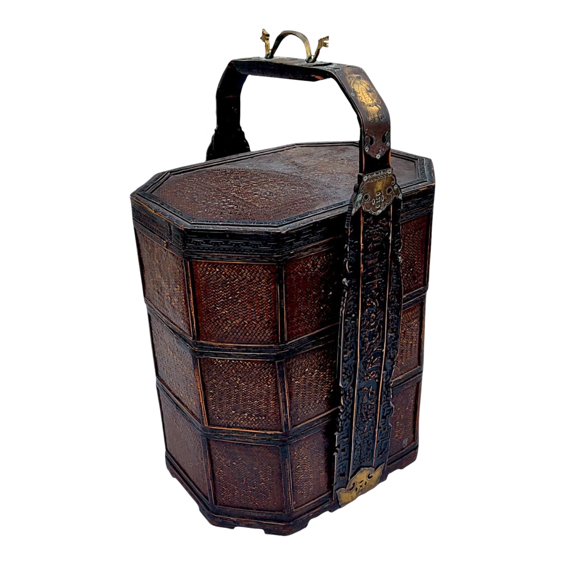 1950's 3 Tiered Octagonal Brass Handled Chinese Wedding Basket: Octagonal Chinese wedding basket (circa late 19th Century) is comprised of a dark mahogany toned whickered bamboo reed and rattan that has a clear all-over protective lacquer finish. Brass medallions