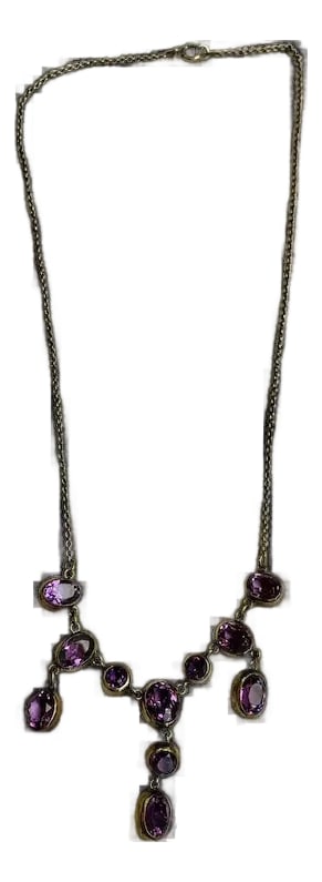 Late 19th Century Victorian Amethyst Necklace: Beautiful Victorian, amethyst necklace, circa 1890-1910. 16 1/2" long, weighing 8.2 grams. The dangling amethysts are stunning and catch the light with every turn. Features 11 oval and round cut