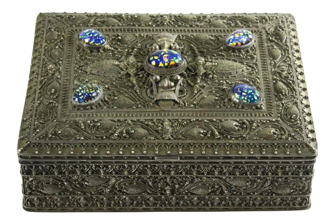 Early 20th Century Balinese Sterling Silver Filigree & Stones Trinket Box: A very fine and unique antique silver box Extremely well elaborated filigree over a high grade solid silver with incrusted beads that look like venetian glass, unless they are some kind of opal or oth