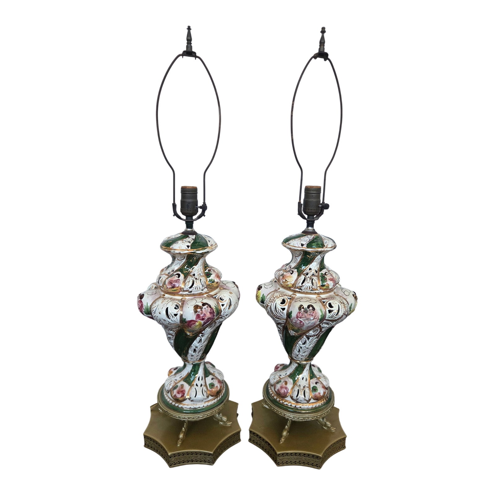 1950s Italian Capodimonte Rococo Revival Porcelain Table Lamps, Pair: Description This elegant pair of Italian Capodimonte table lamps brings Old World romance and refined craftsmanship to any interior. Rich green glazing, hand-painted figural medallions, and pierced po