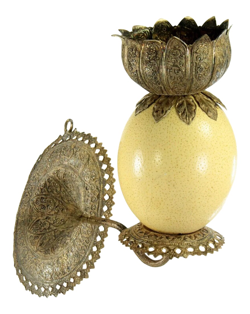 1800's Ostrich Egg & Tooled Silver Repousse Candle Sconce Lamp: A marvelous antique candle sconce, made from an Ostrich egg and solid hand-tooled silver Superb repousse ornamentation throughout The candle holder bowl is a stylized floral bloom Reticulated back