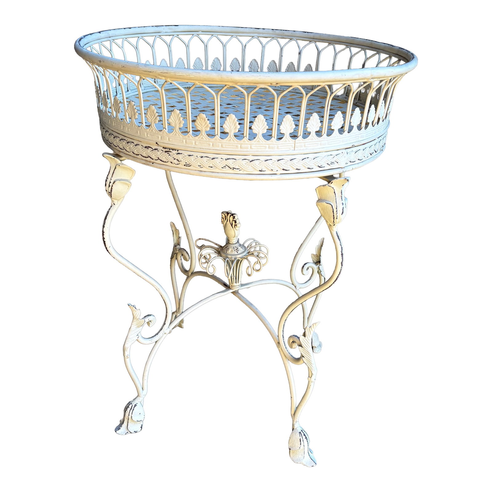 Vintage French Provincial Wrought Iron Round Plant Stand With Gallery Rim: Elegant vintage wrought iron plant stand featuring a round gallery basket top with pierced leaf motif detailing and a lattice base designed to support a planter or liner. The stand rests on four