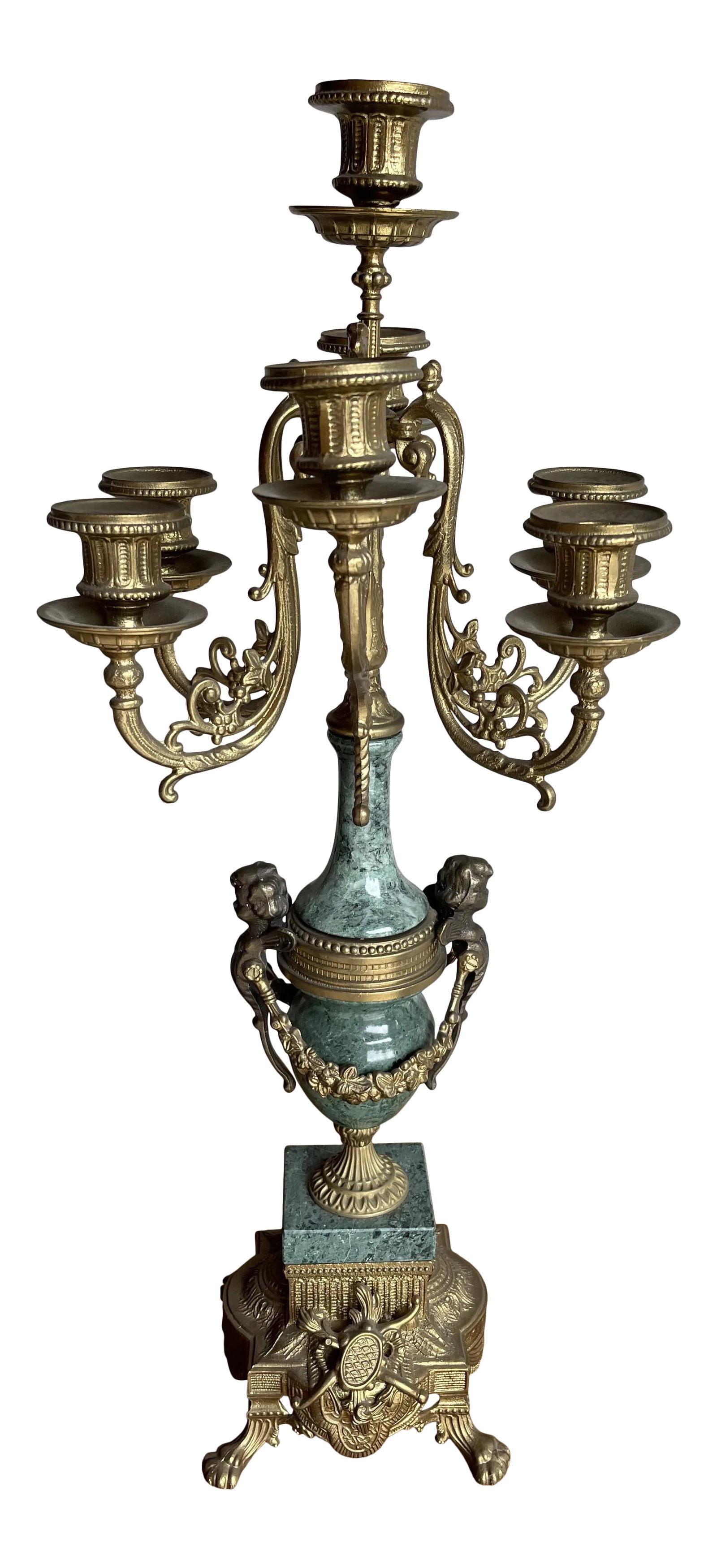 Early 20th Century Lancini Brass & Marble Imperial Candelabra, Made in Italy: A Lancini seven arm brass and marble candelabra, made in Italy. The arms are curved and scrolled, with columnar style holders; it has eagle accents at the base of the center arm. The beautiful verde g