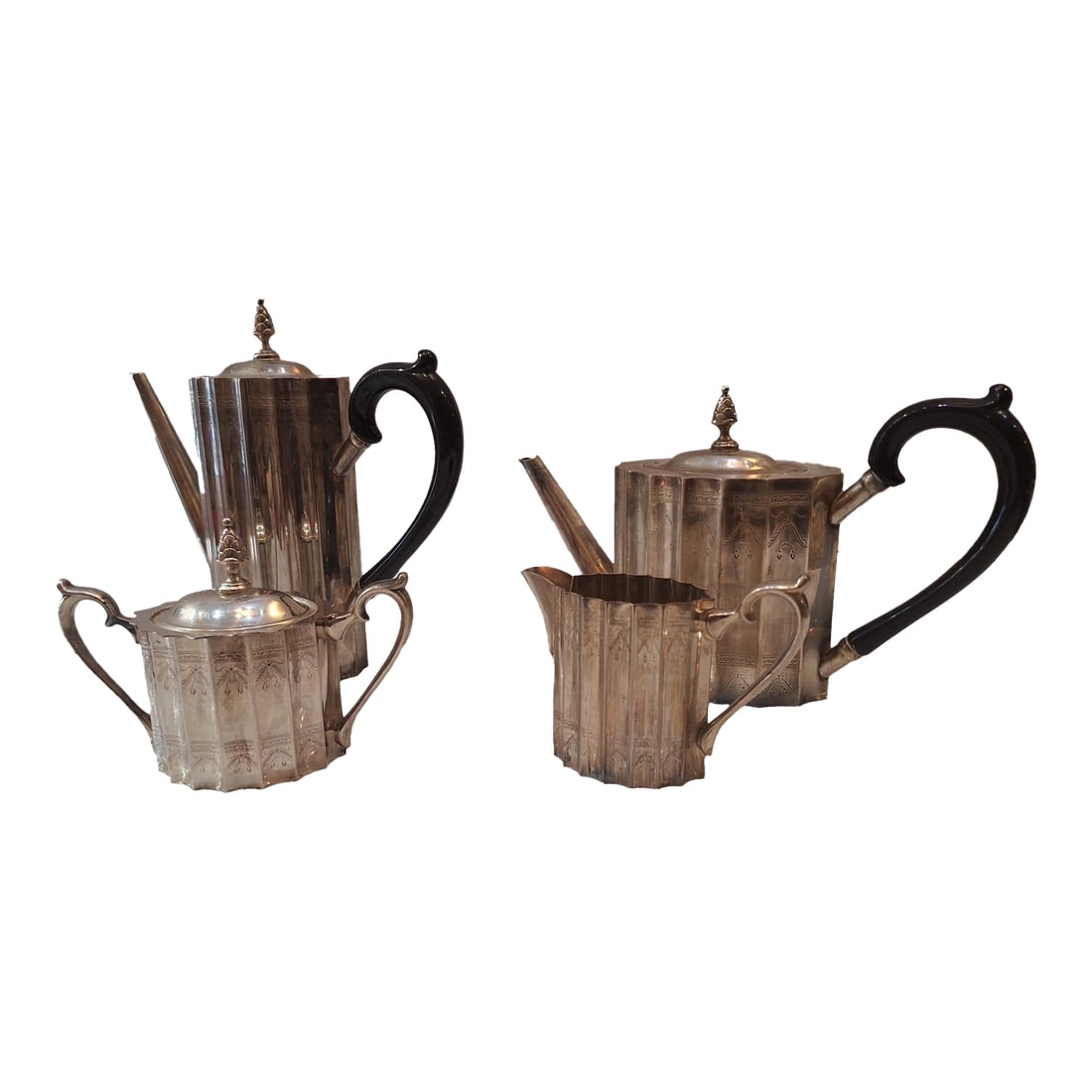 Antique Edwardian Silver-Plated Fluted Tea & Coffee Service With Ebonized Handles, 4-Piece Set: Elegant antique silver-plated tea and coffee service dating to the late Victorian / early Edwardian period, circa 1890-1915. This beautifully proportioned four-piece set includes a tall coffee pot,