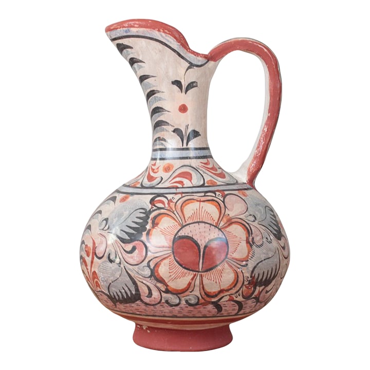1970s Mexican Tonala Pottery Pitcher With Haindpainted Floral Motifs: Vintage hand-painted ceramic pitcher from Tonala, Mexico, decorated with traditional floral and foliate motifs in red, black, and gray tones. Finished in a matte, burnished glaze with a rounded form,
