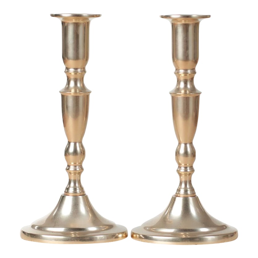 Mid-Century Danish Handmade Brass Candlestick Holders: Vintage pair of Danish brass candlestick holders with a balanced, turned form and softly polished surface. Each piece is marked "Danish Handmade" on the underside. The proportions and restrained detai