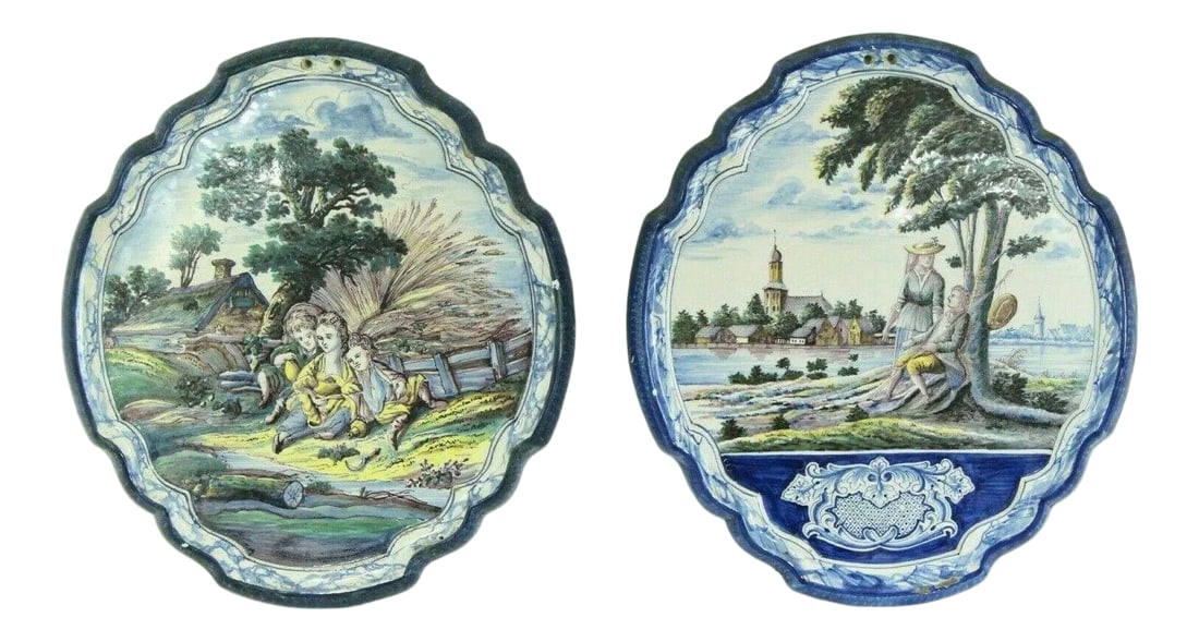 18th Century Dutch Delft Polychrome Faience Plaques Romantic Scene & Children - Set of 2: A very beautiful set of two faience wall plaques Made of the tin-glazed earthenware known as Delft, they feature skillfully hand painted sceneries Although various hues of blue and white are the