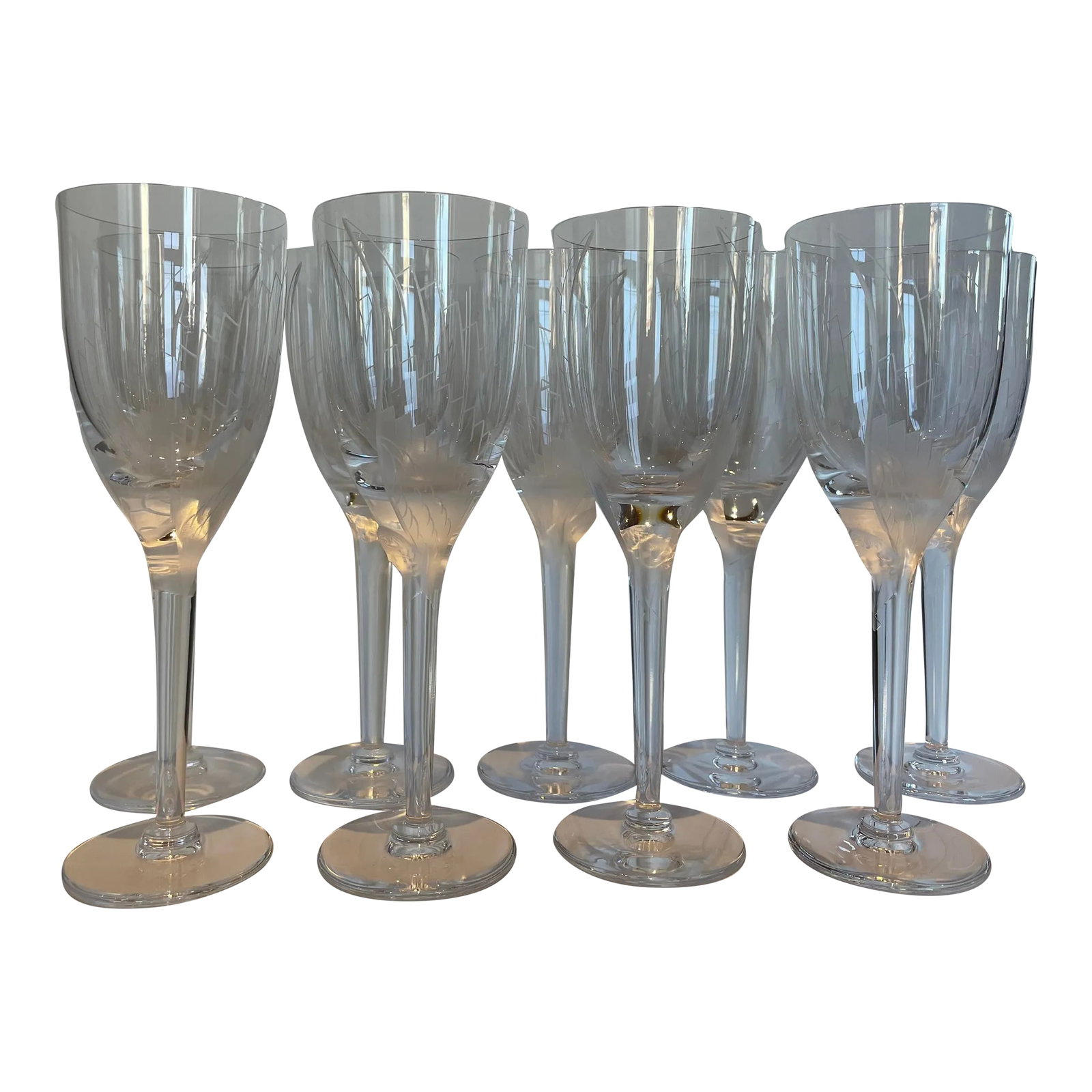 1950s Lalique Ange Champagne Flutes - Set of 9: Nine vintage Lalique "Ange" Fluted Champagne Glasses. These are no longer made so this set it extraordinary in its completeness. They are gorgeous and look splendid with champagne. Tres elegant!