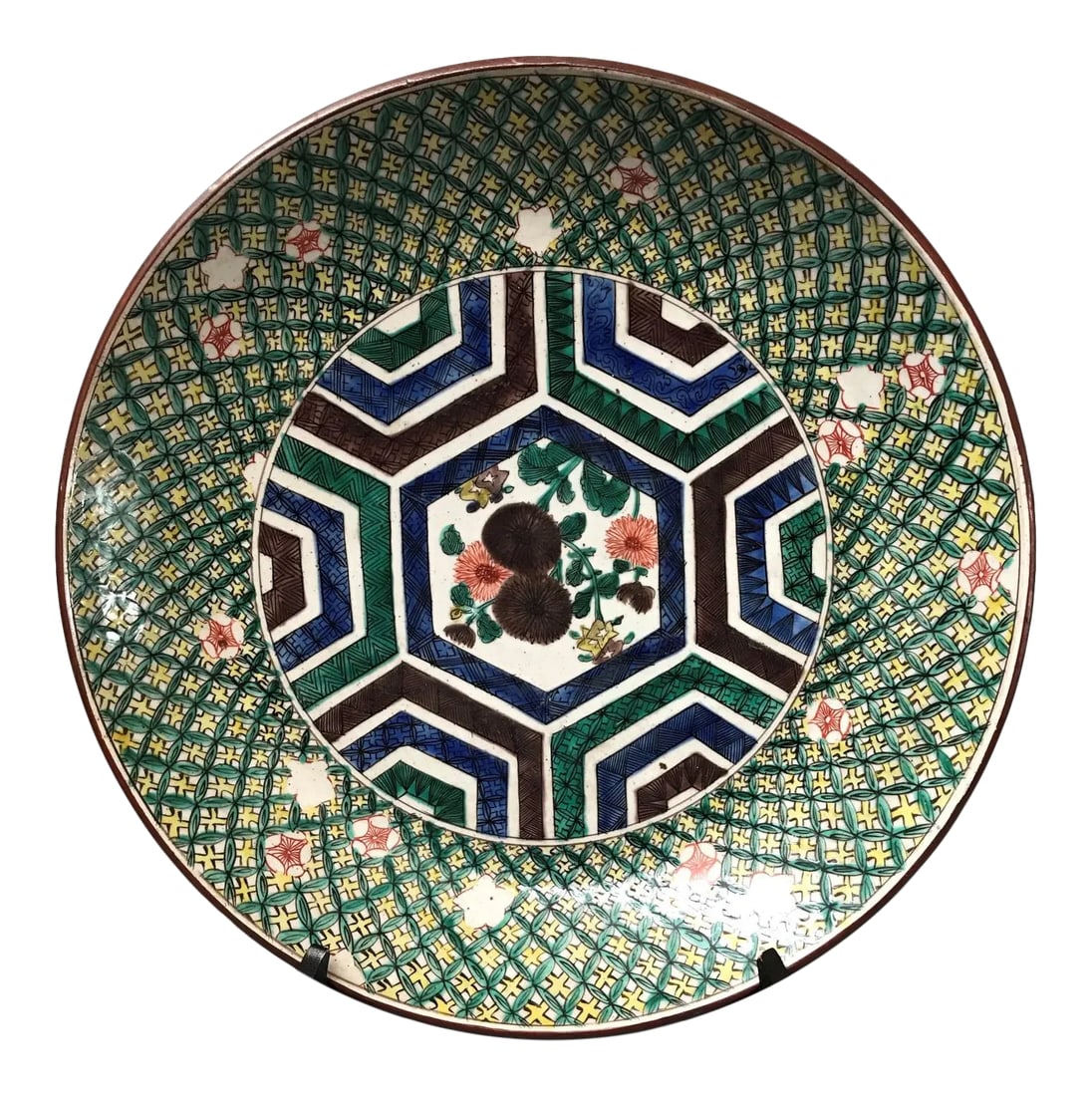 Late 19th Century Kutani Charger in the Yoshidara Style: My first introduction to Ko Kutani wares was in a lecture on Japanese ceramics taught by the late Professor Ross Edman at the University of Illinois Chicago. His enthusiasm for the colorful and