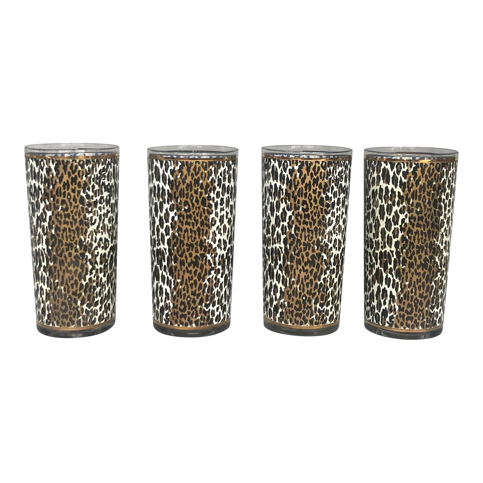 Vintage Culver High Ball Cocktail Glassware Set of 4: Your cocktail party guests will go wild for these vintage leopard print high ball glasses. Display the 1950s glassware set on your bar cart as decor when you are not using them to serve mixed drinks.