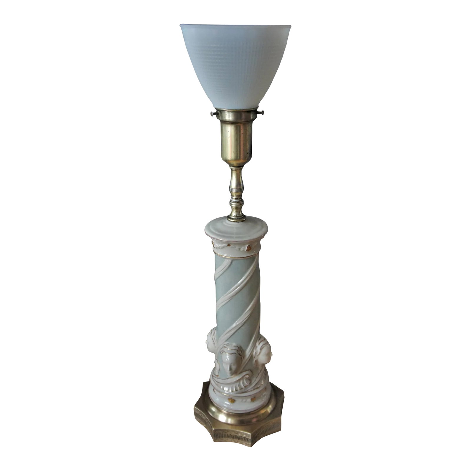 Vintage Rembrandt Porcelain Torchiere Table Lamp: Fantastic Neoclassical Style ceramic column with embossed 4 sided busts with porcelain glaze and gold gilt accents. 6 point brass pedestal with ornate mesh facing. Spindle shaped short neck. Pressed