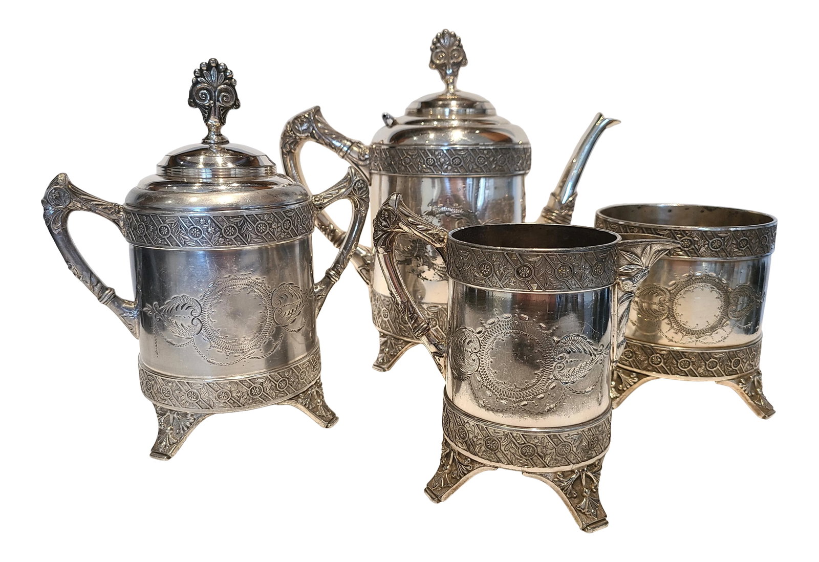1880s Bridgeport Silver Co. Triple Plate Tea Set- 4 Pieces: 4 piece tea set. The Bridgeport Silver Company became part of the International Silver Co. in the late 19th Century. The history of the International Silver Co., and the various companies that joined