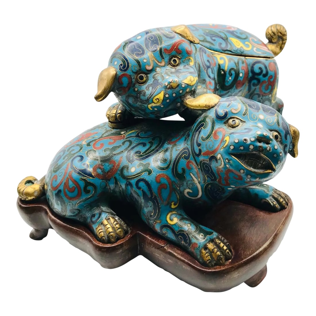 Mid 19th Century Playful Cloisonne Puppies on a Wood Stand From the Qing Dynasty: Until the 20th century, the artisans of China seldom worked as independent artists. The majority of the time, they worked as a group in a workshop, specializing in one particular aspect of the
