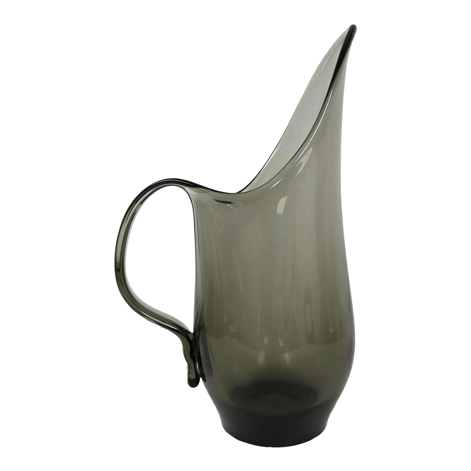 Mid Century Stretched Smoke Glass Pitcher by Elmer E. Miller: This is a stylish hand-blown, smoke glass pitcher with a stretched spout in the style of the Scandinavian mid-century modern aesthetic. It was designed in the 1950's/60's by Elmer E. Miller for the