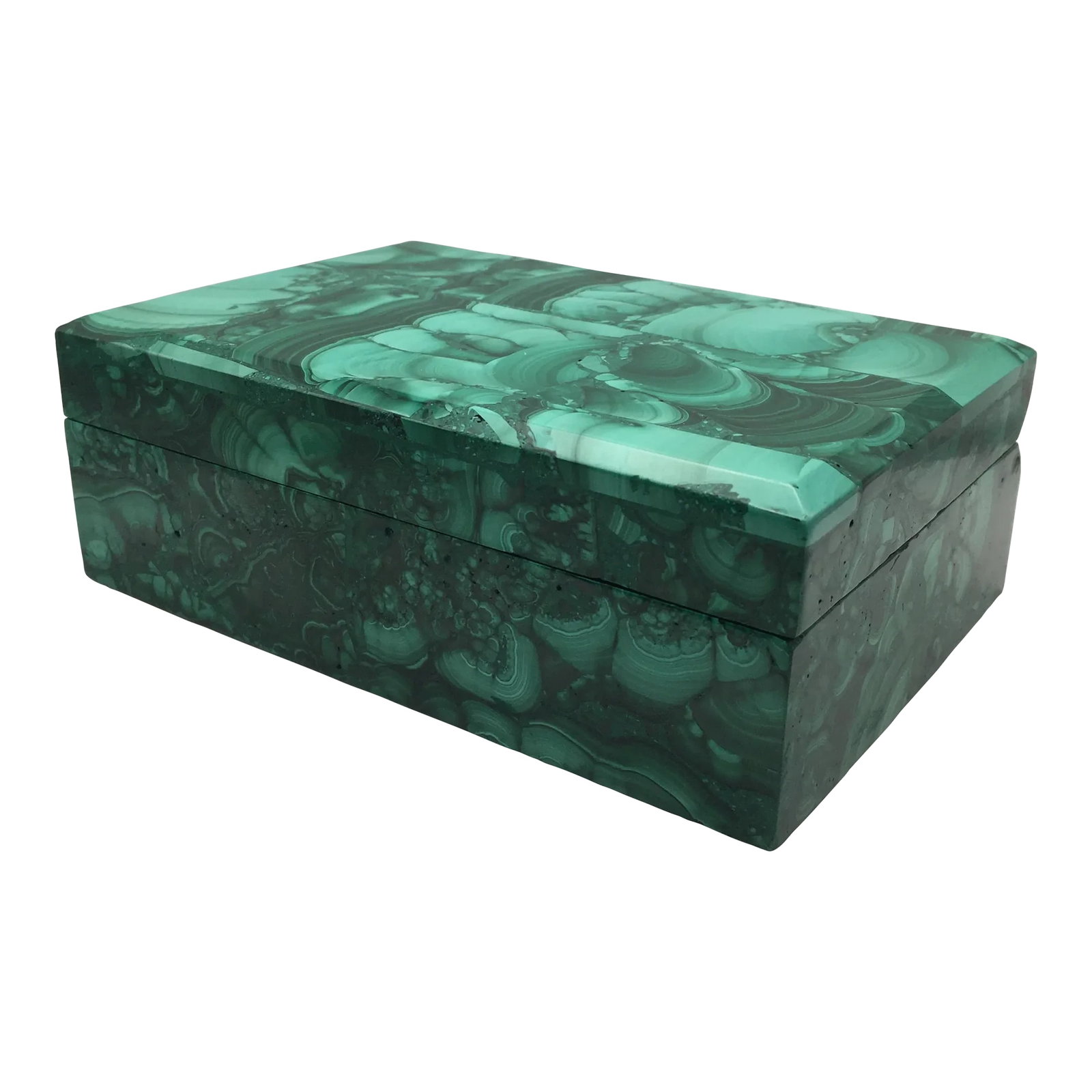 Malachite Accessory Box With Hinged Beveled Lid: Wonderful polished malachite lidded box. The lid is beveled on all 4 sides and adds great depth to the overall appearance of the box. Very pretty and great for bedside for jewelry or wallet or keys.