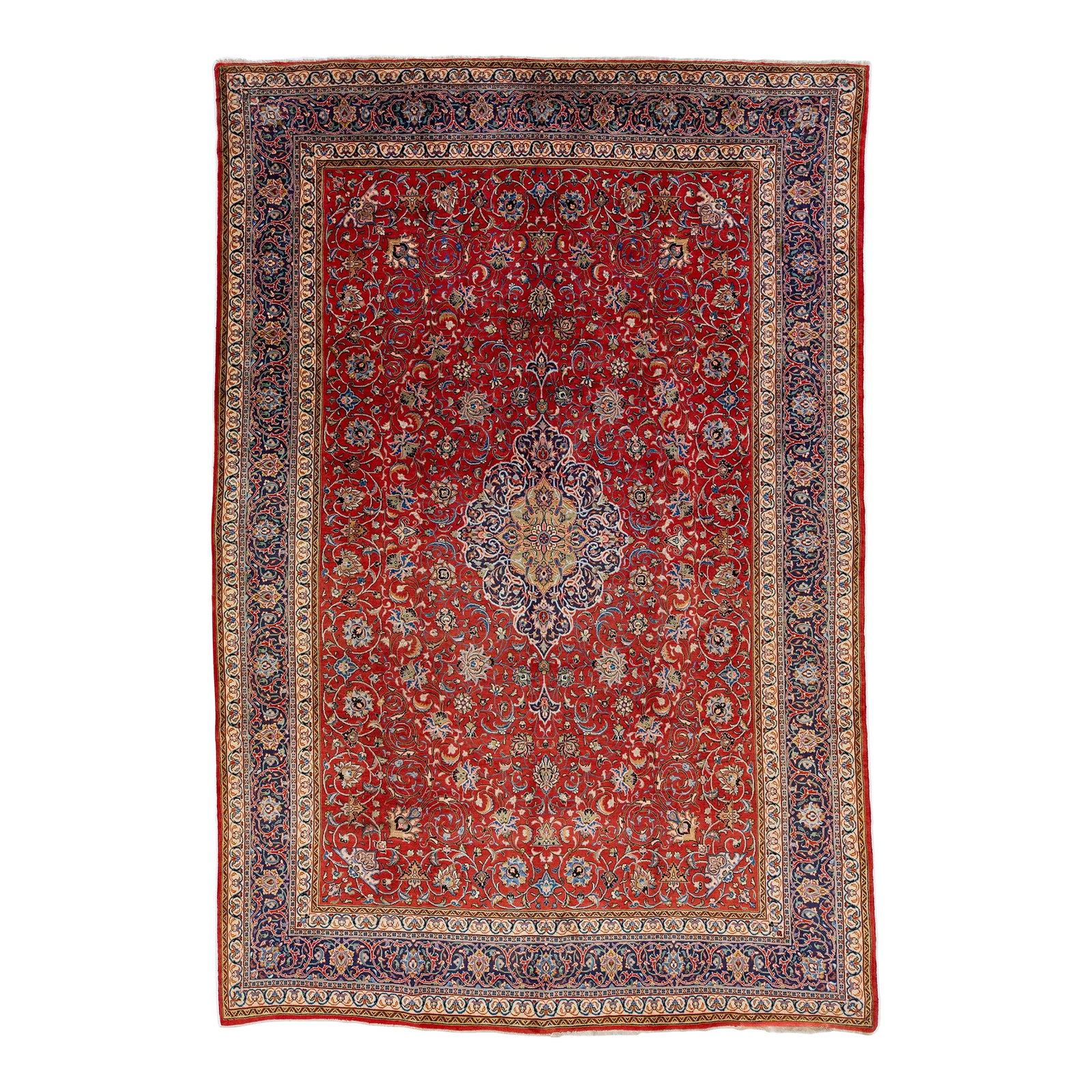 1960s Vintage Kerman Persian Wool Rug Handmade in Red With Allover Motif: This is a classic Persian Kerman rug featuring a red base. It is further adorned with accents in various colors, all presented in a ubiquitous geometric medallion pattern. This rug measures: 9'2'' X 1