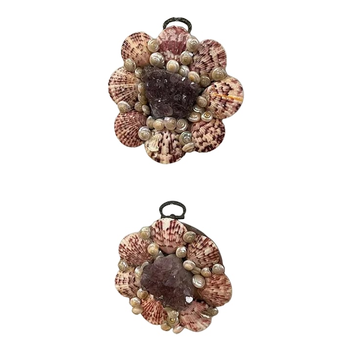 Pair of 21st Century Shell Framed Amethyst Plaques: A lovely pair of wooden plaques with an ornamental hook purple amethyst surround by colorful shells Condition: Alterations: Original Condition Unaltered Imperfections: Some Imperfections Condition