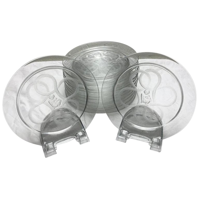 Mid 20th Century 12 Art Deco Lalique Cherub and Rope Motif Plates: 12 Art Deco Lalique cherub and rope motif plates, a rare find, eight vintage Lalique plates. In excellent condition. Condition: Alterations: Unknown Imperfections: Some Imperfections Condition Notes: