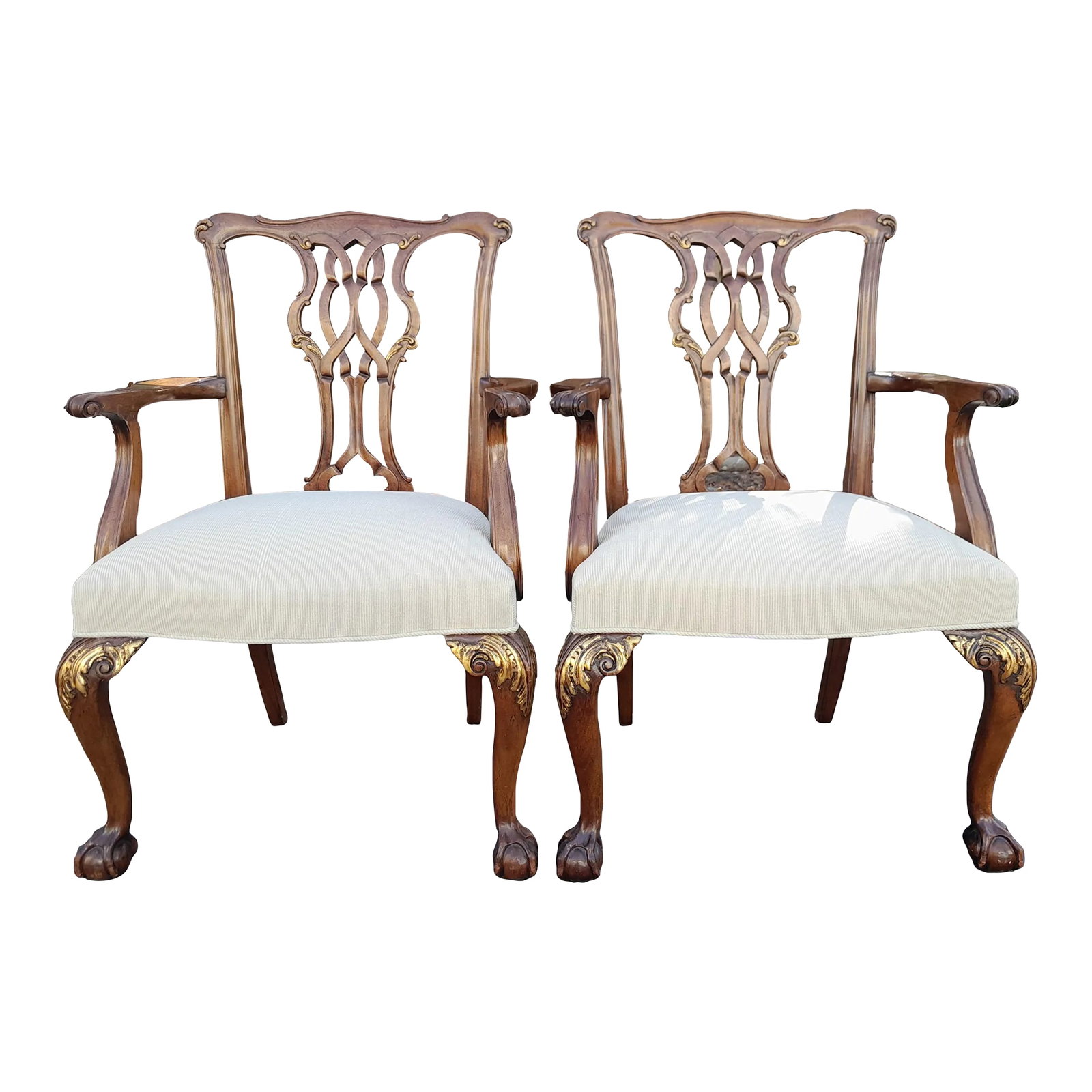 Pair of 1990s Baker Furniture Company Chippendale Style Ball & Claw Armchairs With New Upholstery: Attractive pair of Baker armchairs in Mahogany with Gold details. Chippendale Style with ball and claw feet. Newly recovered in a beige linen fabric. Condition: Alterations: Original Design Modified I