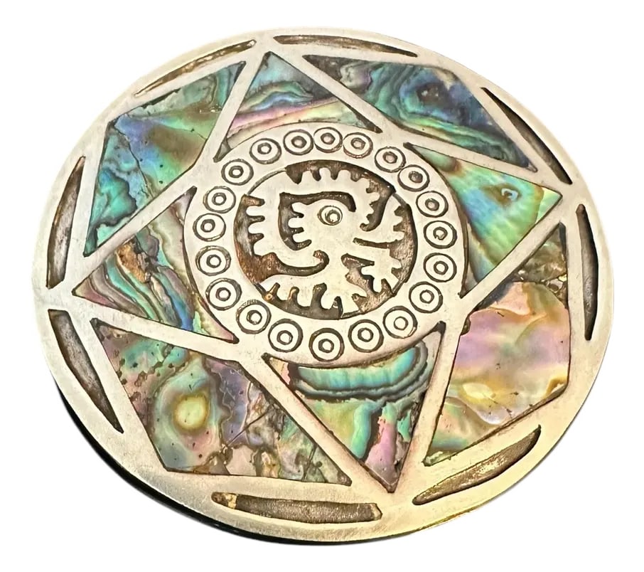 Vintage Taxco 925 Sterling Silver Abalone Shell Brooch Pendant Ozomatli Made in Mexico: Ozomatli the Aztec monkey is known as the companion spirit symbolic with arts, games, and fun. A servant of the god Xochipilli-God of music and dance. Offering a 2.25 round sterling silver Taxco piece