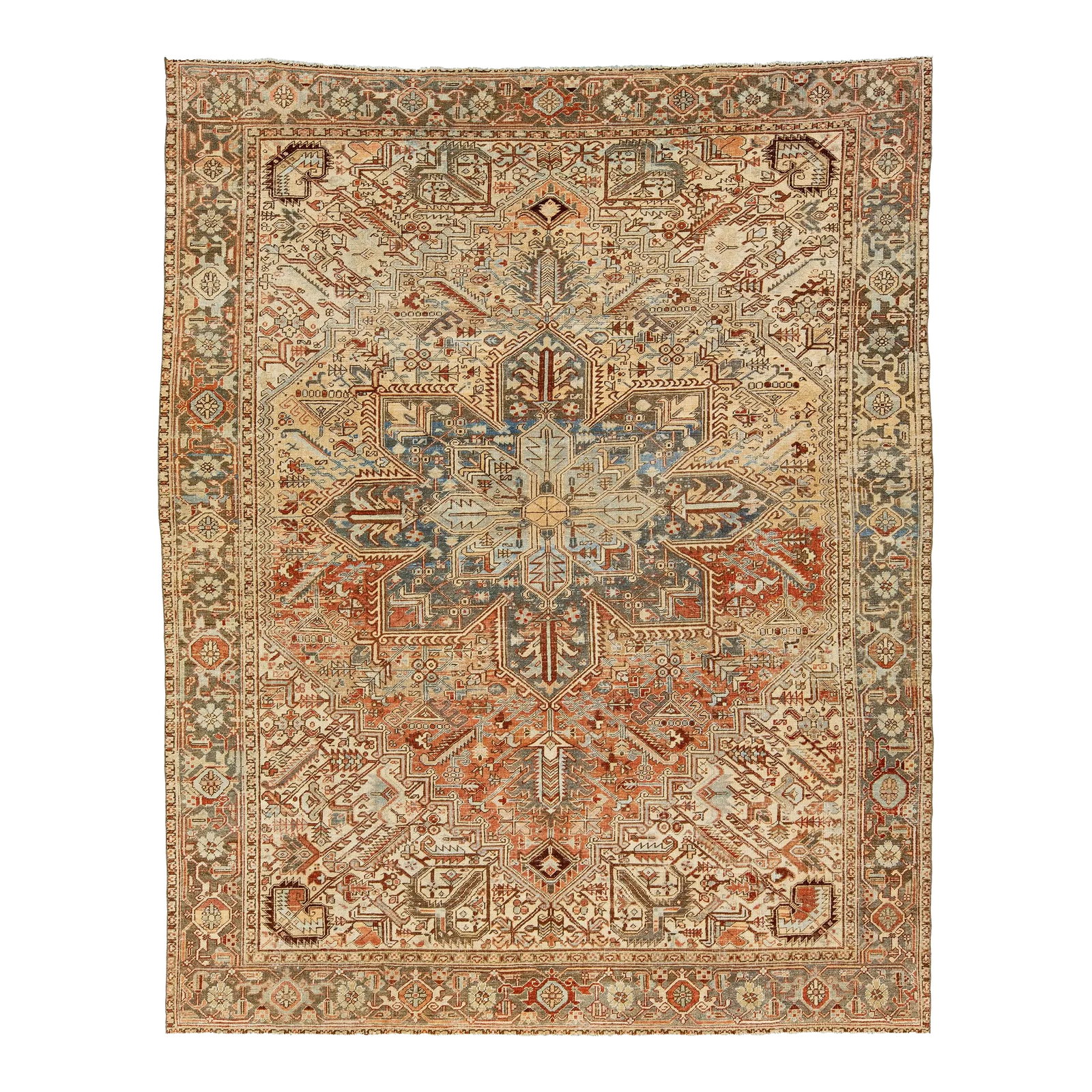 Peach Persian Heriz Antique Wool Rug Featuring a Medallion Motif From the 1920s: This antique Persian Heriz rug features a captivating allover pattern with shades of blue, rust, brown, and ivory on a peach field. It is hand-knotted using wool. This rug measures 8'8' x 10'10". Our