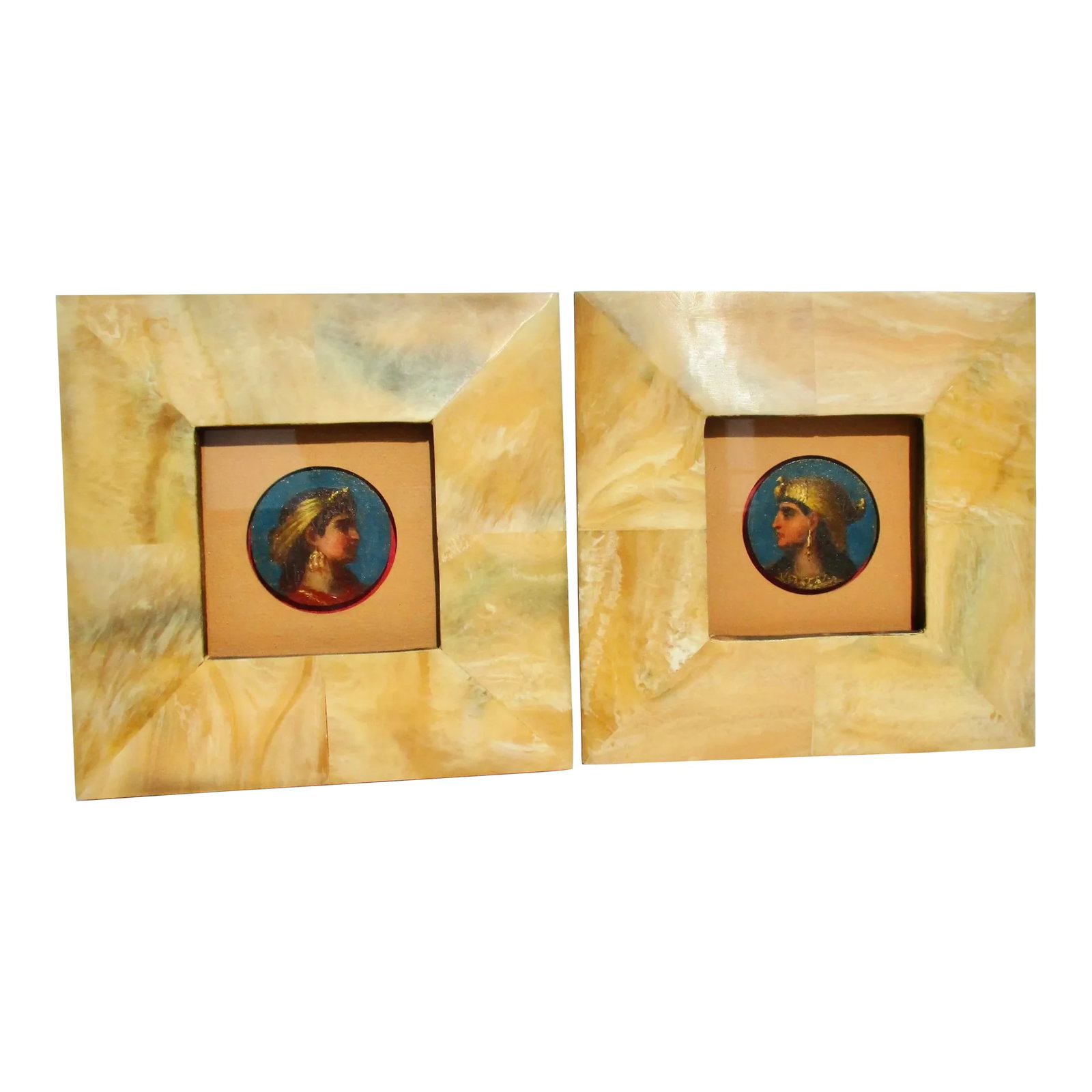 Egyptian Revival Portraits- Pair of 2: Wonderful pair of Egyptian-inspired Queen profiles. Shown in Indian Horn Table frames with wire to wall hang. The medallions are very richly colored ladies in golden attire against a deep blue sky.