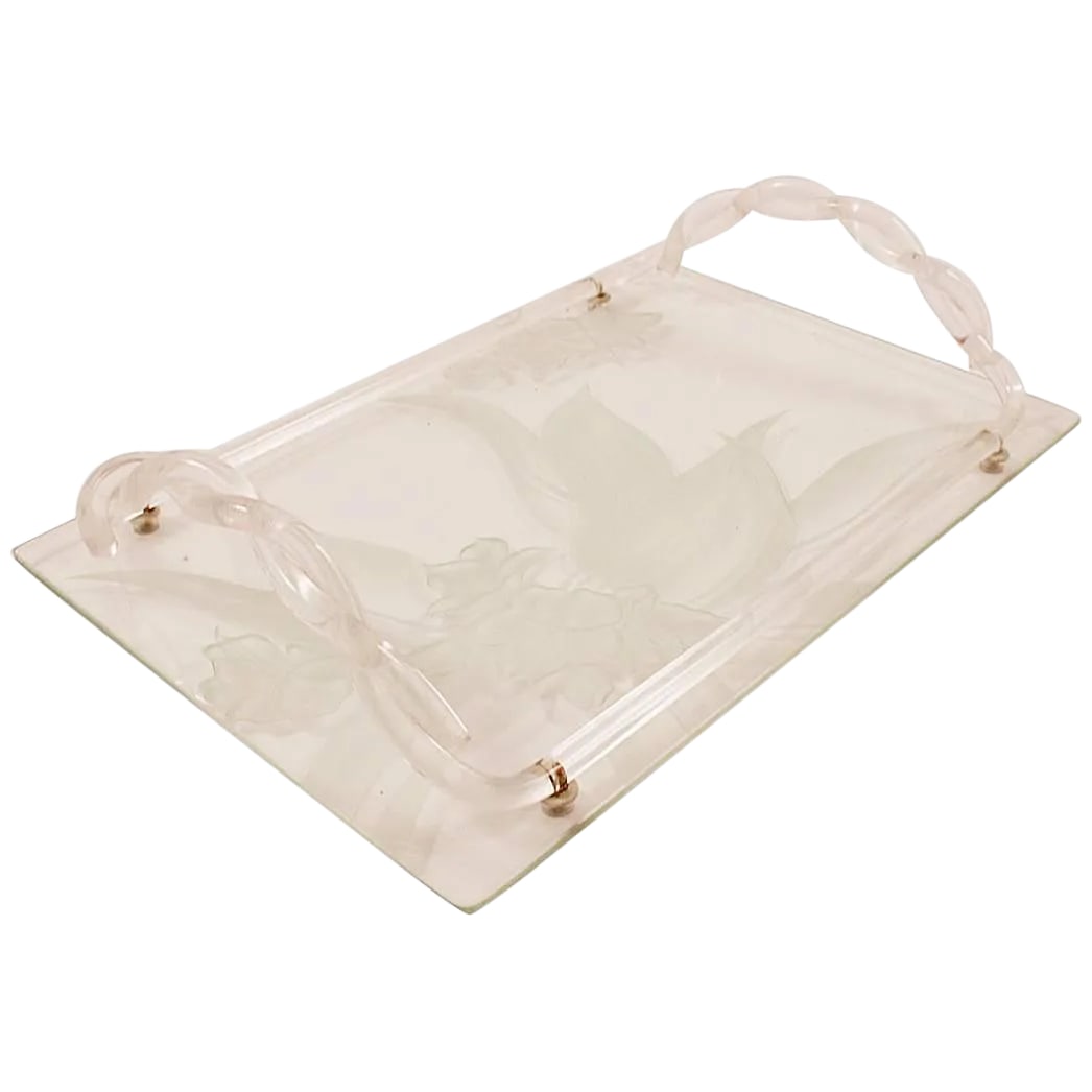 1940s Dorothy Thorpe Etched Glass and Lucite Tray: Art Deco serving tray by Dorothy Thorpe. The tray has signature etched floral motif, with rope twist Lucite handles. Excellent original condition, marked with the Thorpe cartouche. Condition: Alterati