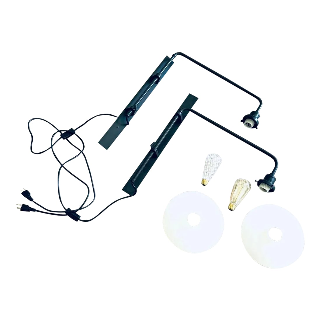 Pair of Restoration Hardware Train Station Wall Lights: Retired and sought-after from RH's industrial collection. High quality, heavy lighting. Set of two. Swing arms allow for precise positioning of light when reading in bed, etc. Stunning simple design