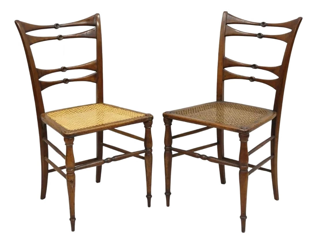 Mid 19th Century Antique Italian Biedermeier Arts & Crafts Walnut Bowtie Chiavari Side Chair Pair: Antique Italian Biedermeier Arts & Crafts Walnut Bowtie Chiavari Side Chairs - a Pair. Chairs feature clean lines, turn carved spindle legs and stretchers, cane seats, very unique "bowtie" backs, wond