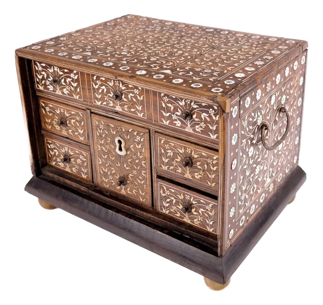 Inlaid Table Cabinet: Inlaid table cabinet with six compartments and two handles. This is a beautifully decorated crafted box reflecting the craftsmanship and cultural influences of Goa during the colonial period. Goa, a