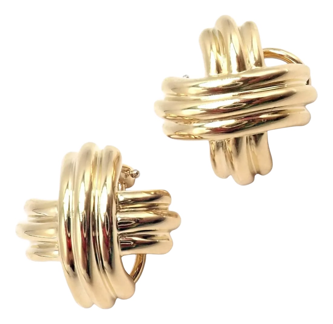 Late 20th Century Vintage Tiffany & Co. X Kiss Yellow Gold Medium Earrings, A Pair: Vintage Tiffany & Co. X Kiss 18k Yellow Gold Medium Earrings These earrings are clip-ons, cushion backs provided upon purchase for secure clasping. Details: Metal: 18k yellow gold Measurements: 19mm