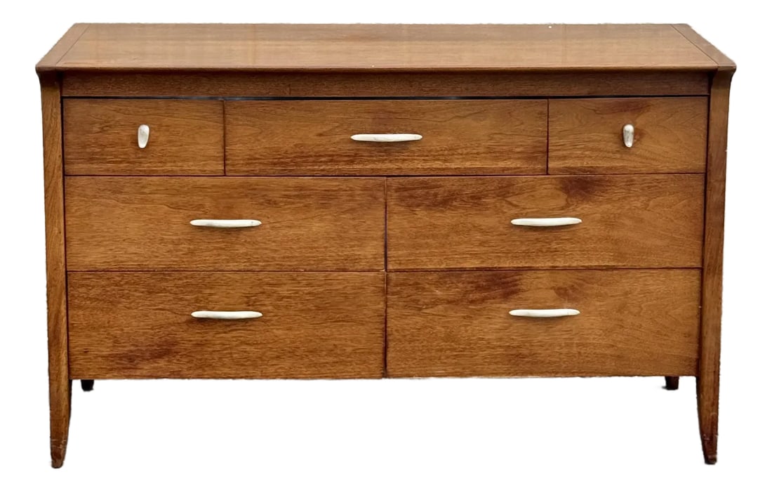 1960s Mid-Century Modern Small Walnut Dresser by Drexel: The walnut dresser by Drexel dates to the 1960s. It showcases the clean lines and timeless appeal of mid-century modern design. Featuring four spacious drawers and two smaller upper drawers. Tapered