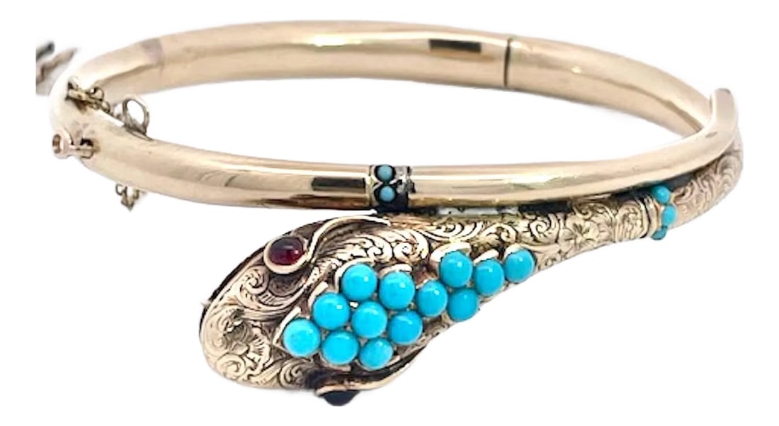 14k Yellow Gold Turquoise Snake Bracelet: This simple snake bracelet is coveted. I have listed and sold three other Turquoise head snake bracelets. This one is thin and near perfect. Garnet eyes and turquoise beads adorn this snake. There