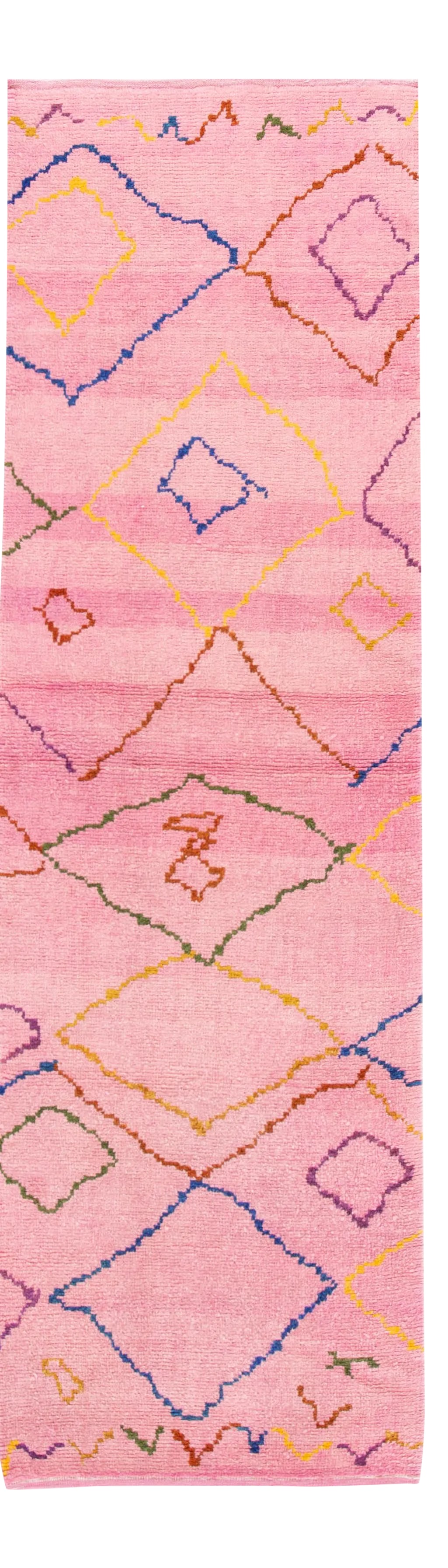 21st Century Modern Moroccan Style Wool Runner: Beautiful contemporary Moroccan style runner rug, hand-knotted wool with pink accents, multi-color accents in a gorgeous all-over tribal design. This rug measures: 2'10" x 9'9". Condition: