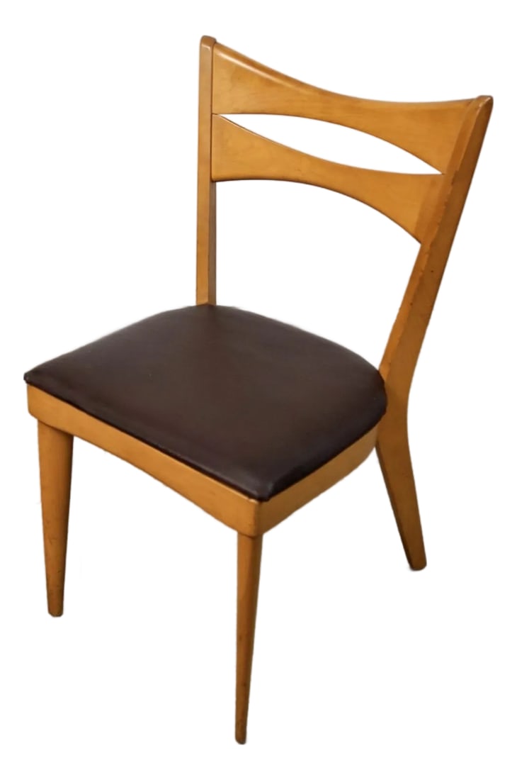 1950's Mid-Century Modern Heywood Wakefield Cat's Eye Chair: Vintage original Midcentury Modern Heywood Wakefield dining chair for sale. This is the Cat's Eye chair manufactured by Heywood Wakefield, and is very solidly built. It's made of solid maple, and has 