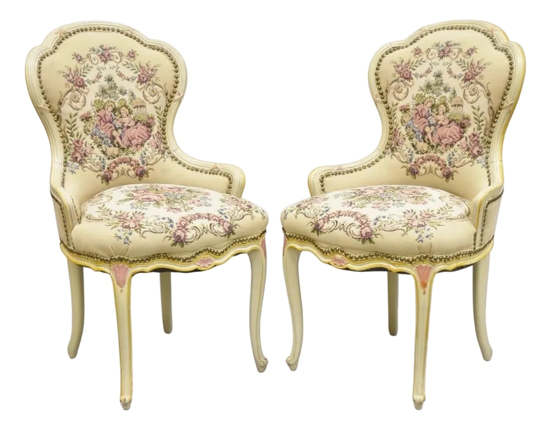 Vintage French Louis XV Style Cream & Pink Painted Boudoir Slipper Chair - Pair: Vintage French Louis XV Style Cream & Pink Painted Boudoir Slipper Chairs with Floral Tapestry Upholstery - a Pair. Circa Mid 20th Century. Measurements: 36" H x 21" W x 23" D x 19" Seat height.