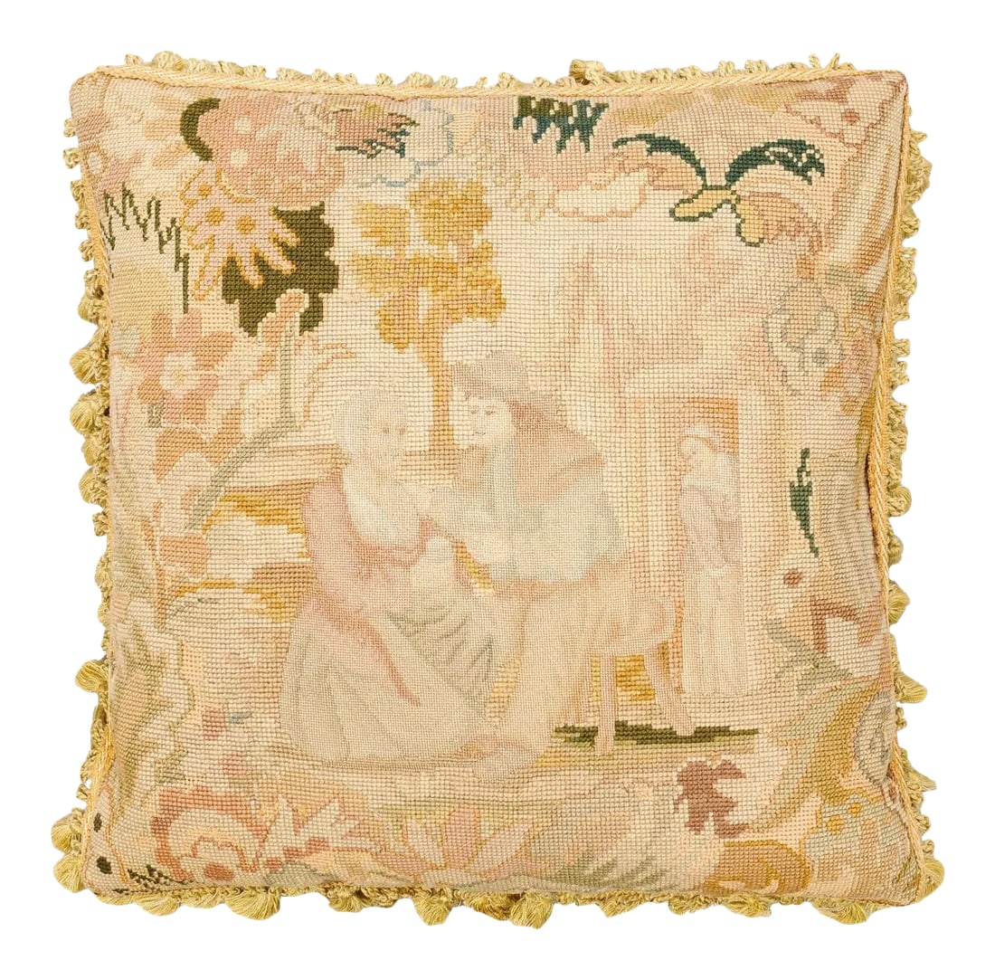 French 19th Century Needlepoint Tapestry Pillow: A French needlepoint tapestry pillow from the 19th century, depicting a genre scene. Created in France during the 19th century, this needlepoint tapestry pillow charms us with its romantic depiction