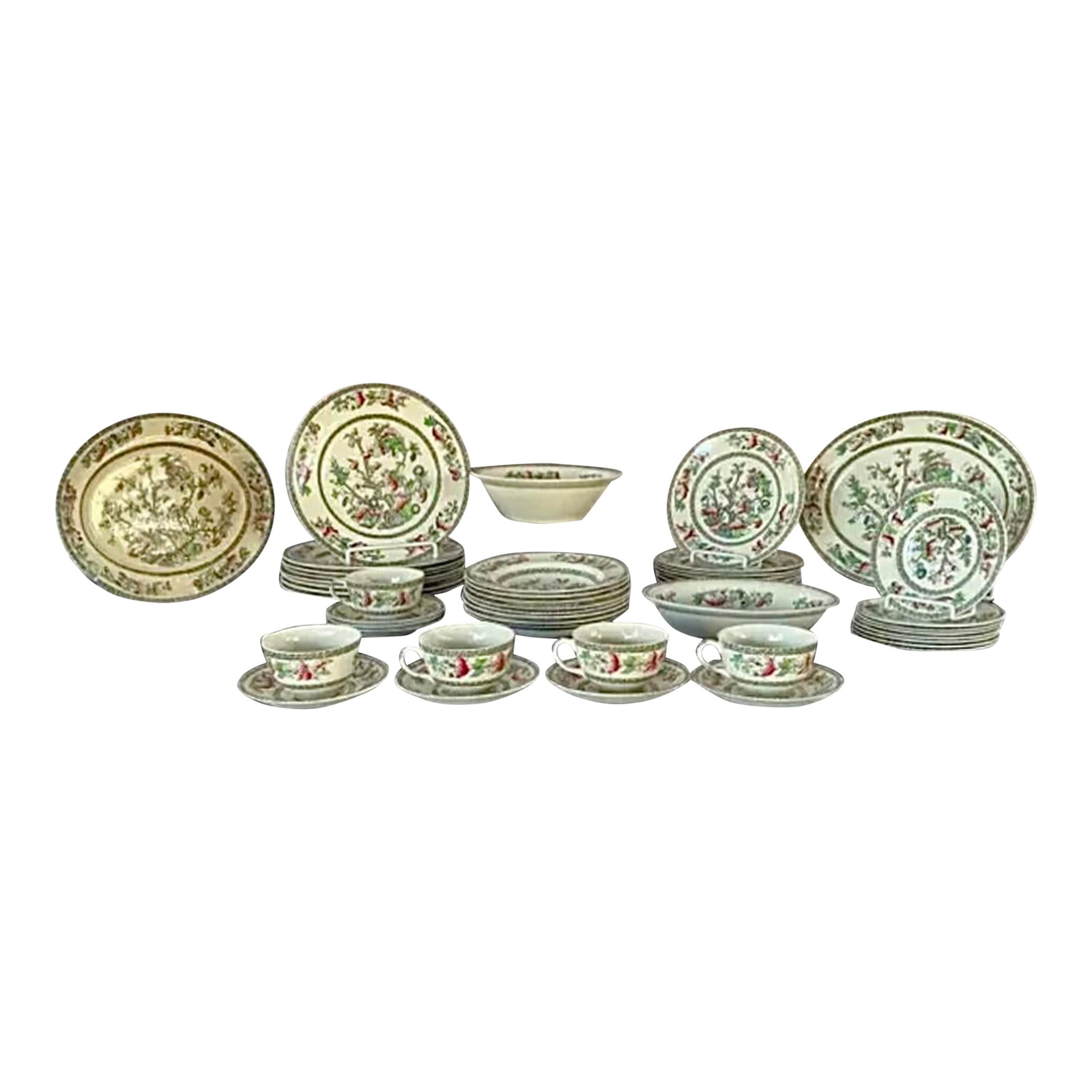 Mid 20th Century Johnson Brothers Indian Tree China, Set of 49 Pieces: Mid-20th Century Johnson Brothers "Indian Tree" China, Set of 49 Pieces. This iconic design features richly colored floral and foliate motifs in vibrant greens, reds, and blues with gilt highlights an