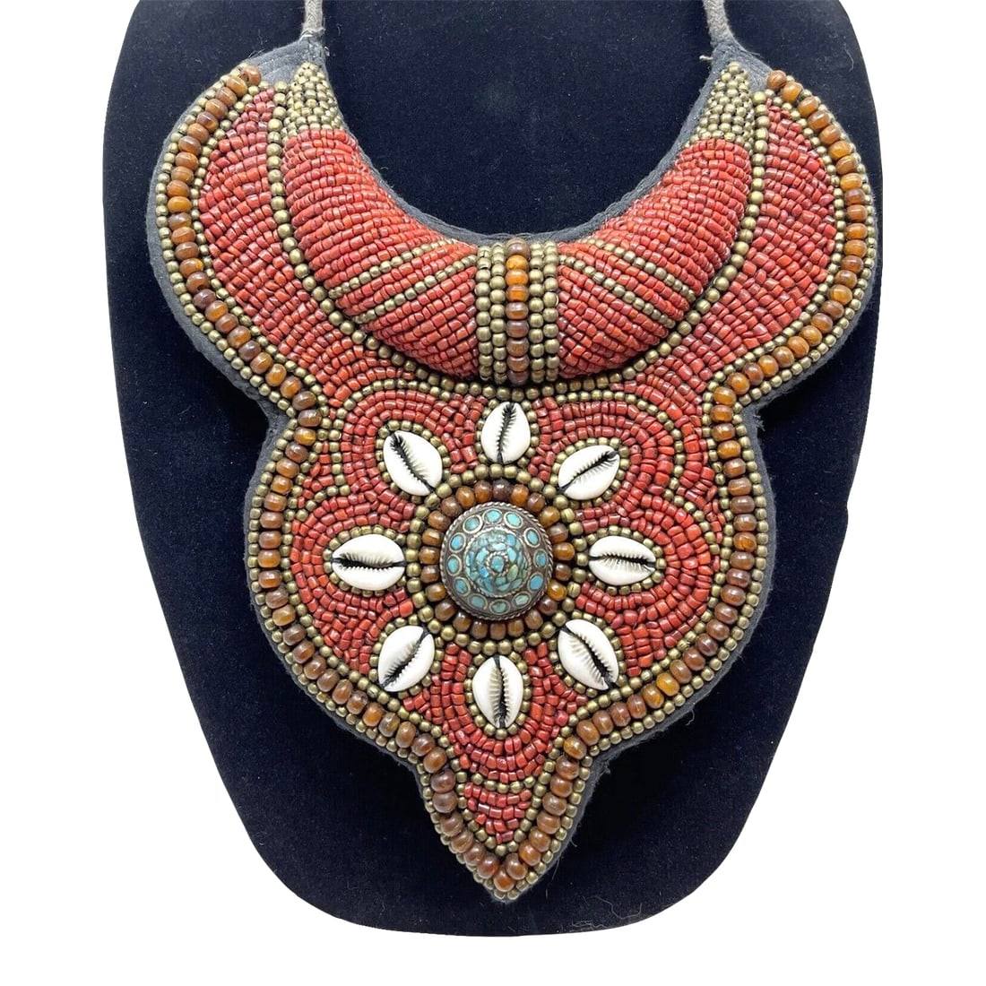 1970s Tibetan Beaded Bib Collar Necklace, Coral, Turquoise, Cowrie Shells: Beautiful Tibetan tribal bib necklace handmade in the Himalayan region. These traditional pieces are often referred to as a "breastplate" or "Skeypuks". Meticulous hand beaded design using natural