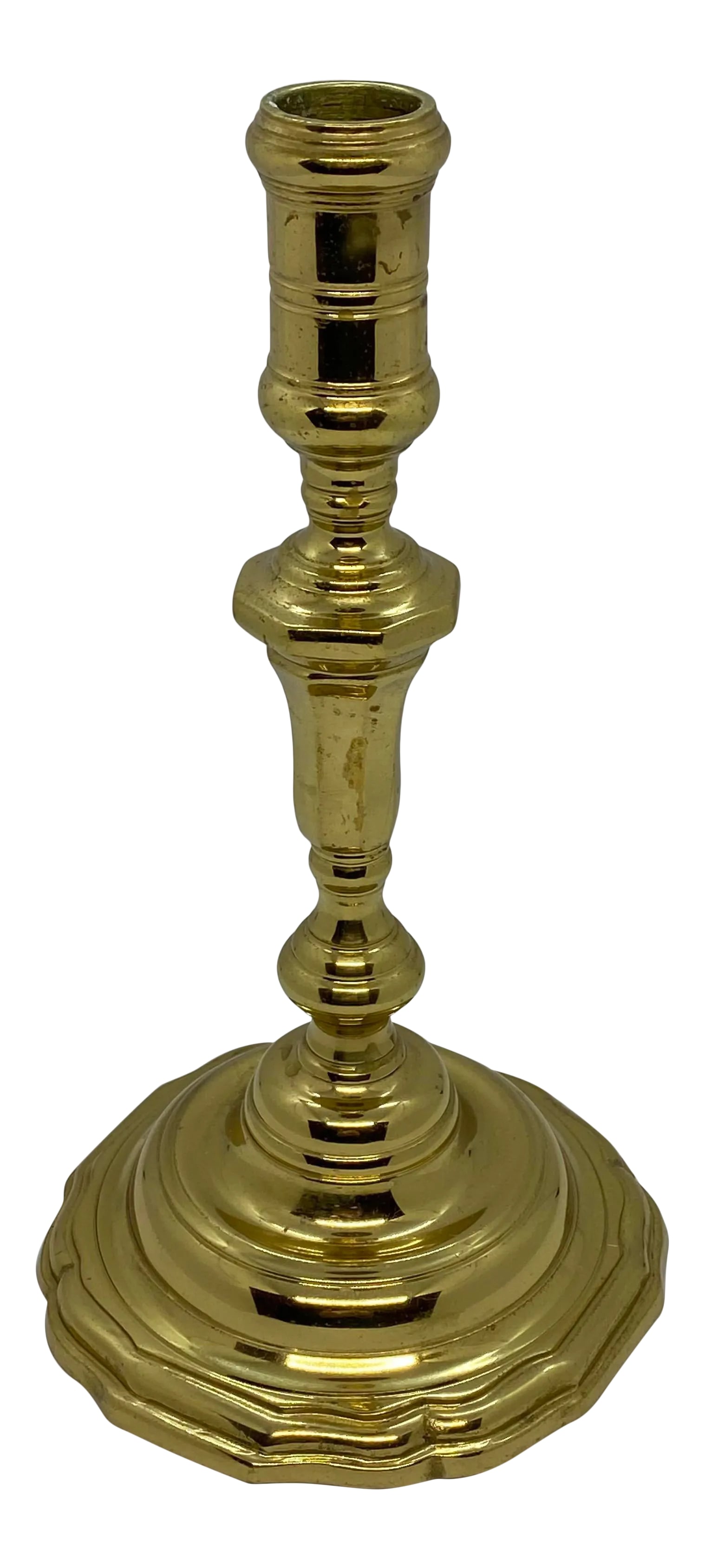 Mid 20th Century Virginia Metalcrafters Colonial Williamsburg Brass Candle Holder: A classic brass candle holder by Virginia Metalcrafters for their Colonial Williamsburg collection. It is fully marked on the bottom (CW-16-36). A handsome antique, probably of French origin, has