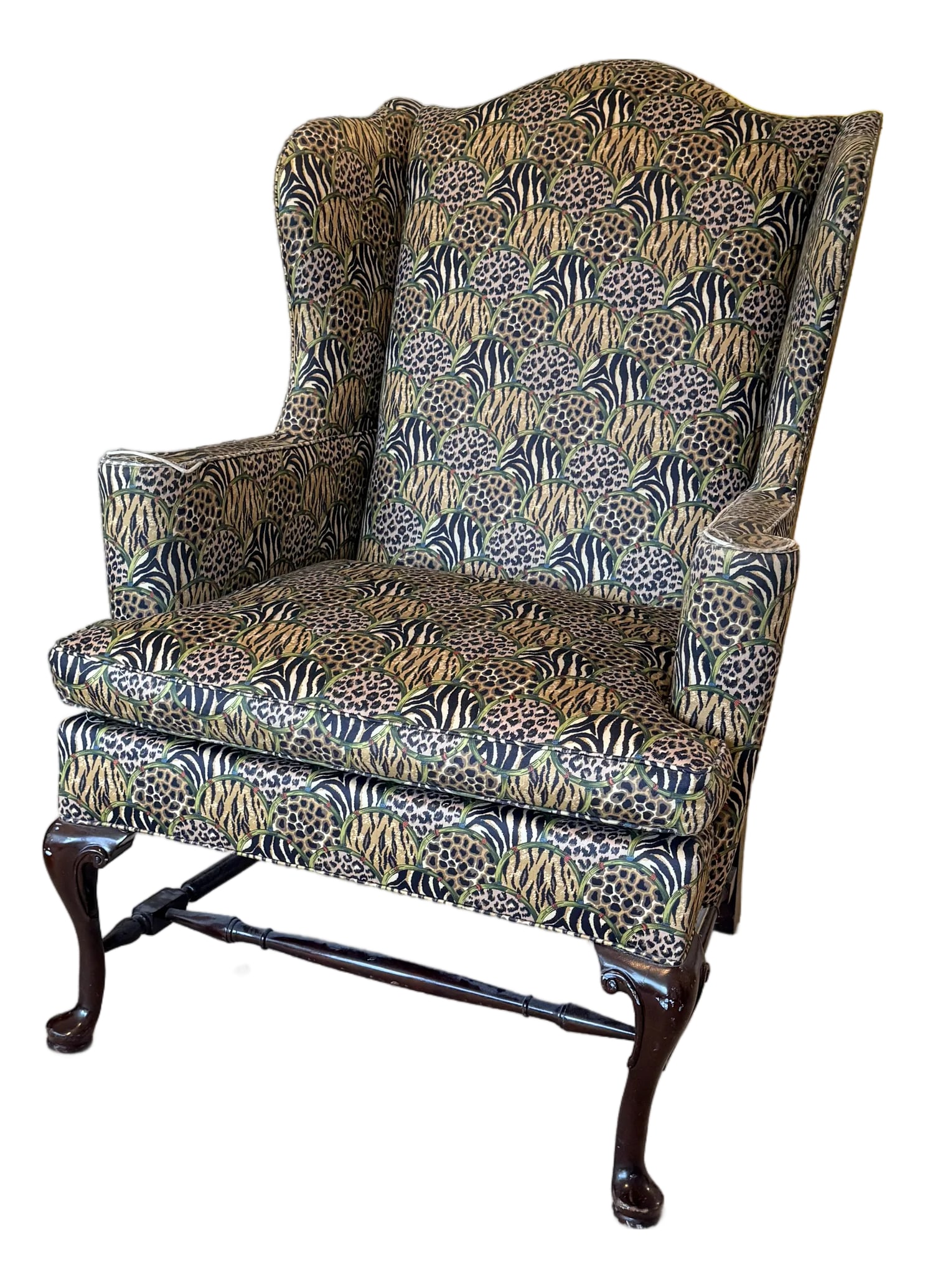 Vintage Hancock & Moore Animal Print Wingback: Vintage Hancock & Moore Animal Print Wingback Tradition meets whimsy in this fun wingback chair which features an arched back and curved arms atop curved Queen Anne legs. (Trim on arms needs to be