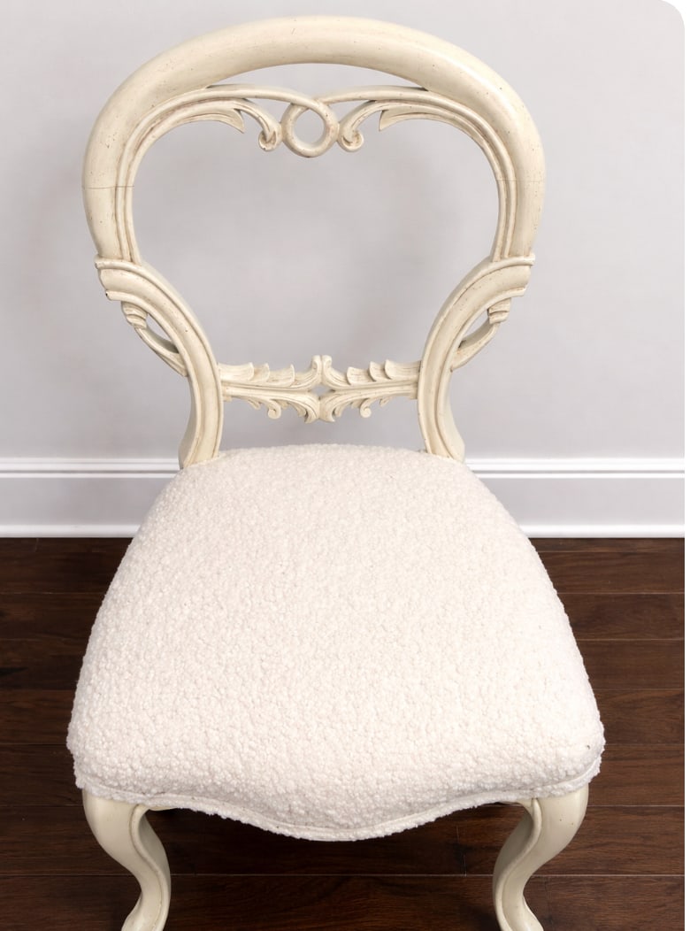 Pair of French-Style Dining Chairs With Carved Backs and White Boucle Upholstery - 2