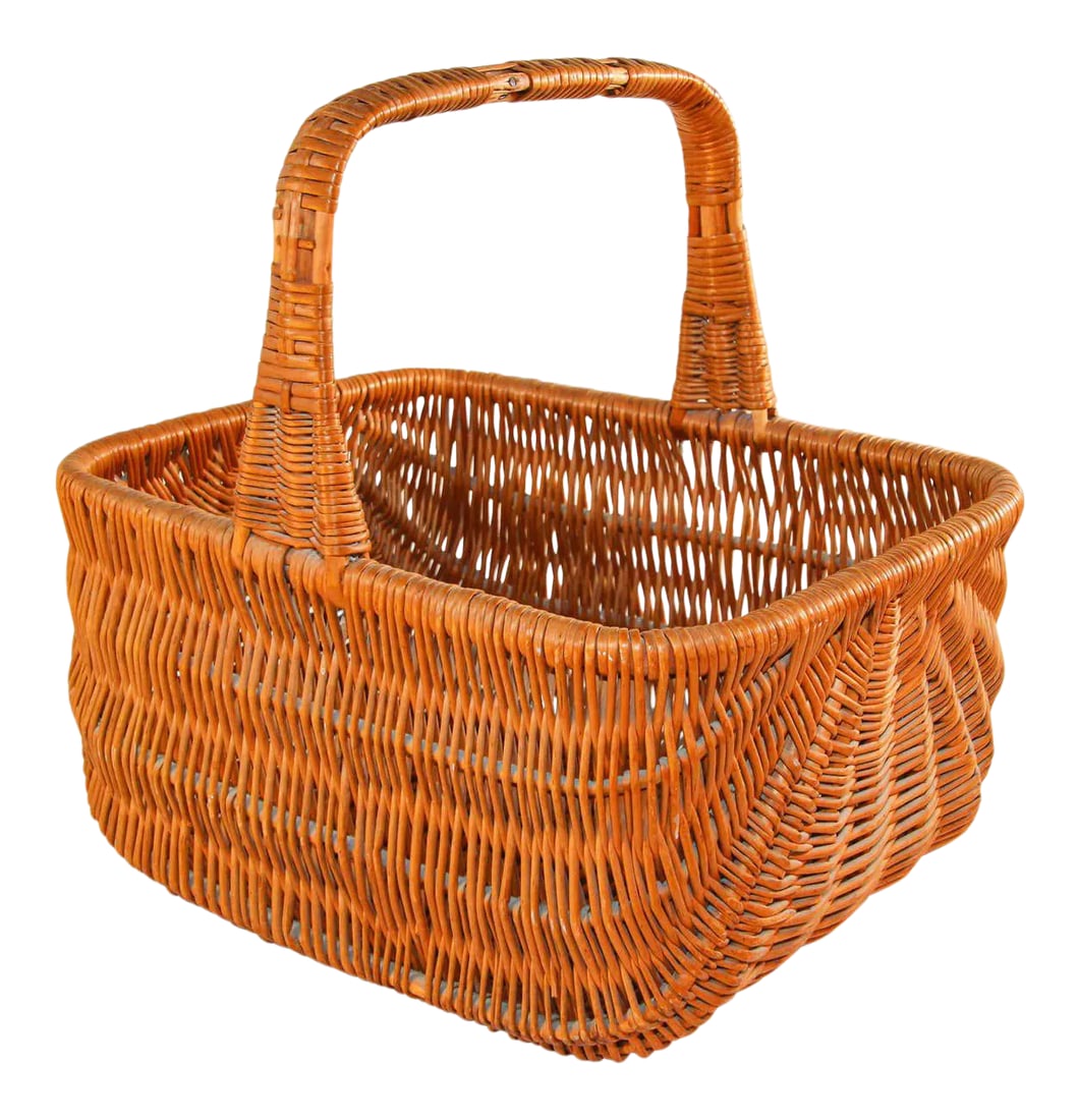 1950s French Provincial Rattan Handled Basket: Vintage rattan picnic basket, 1950s, France. Mid-Century Modern vintage French Provincial rattan handled shopping basket, made out of woven rattan. The vintage condition is very good with minor signs
